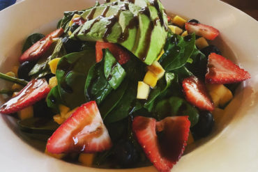 The Sunburst Salad, with avocados and strawberries.